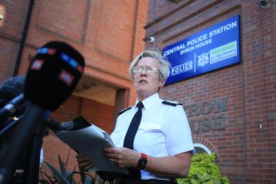 Nottinghamshire Police Chief Constable Kate Meynell reads a statement after three people were found dead. EPA