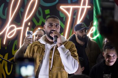 Rapper Belhassen aka EMP1RE holds a mini-concert at the cultural cafe Biblio'The in Lafayette neighbourhood of downtown Tunis. Photo: Bibliothe Cafe