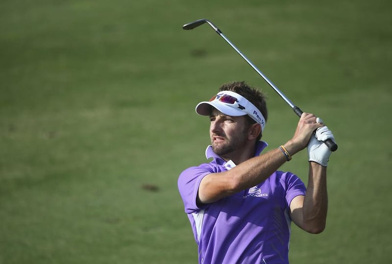 Jbe Kruger of South Africa plays his second shot on the 16th hole during the final round of the Dubai Open at The Els Club Dubai on December 21, 2014 in Dubai, United Arab Emirates.  (Photo by Francois Nel/Getty Images)