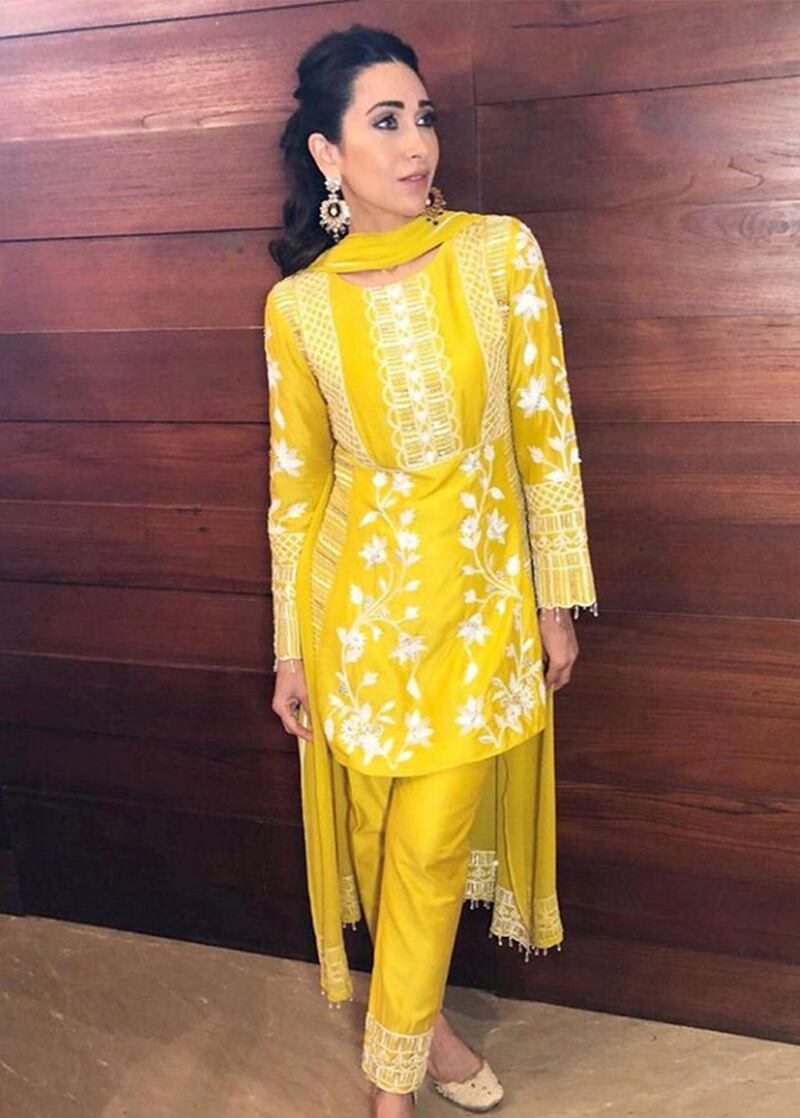 Karisma Kapoor in a simply-cut, lavishly embroidered Manish Malhotra creation