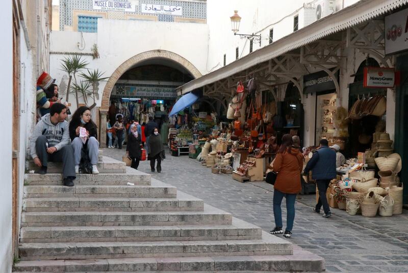 People walk in the Medina, in the old city of Tunis, amid the coronavirus disease (COVID-19) outbreak, Tunisia March 24, 2021. Picture taken March 24, 2021. REUTERS/Salwa Jaouadi   NO RESALES. NO ARCHIVES