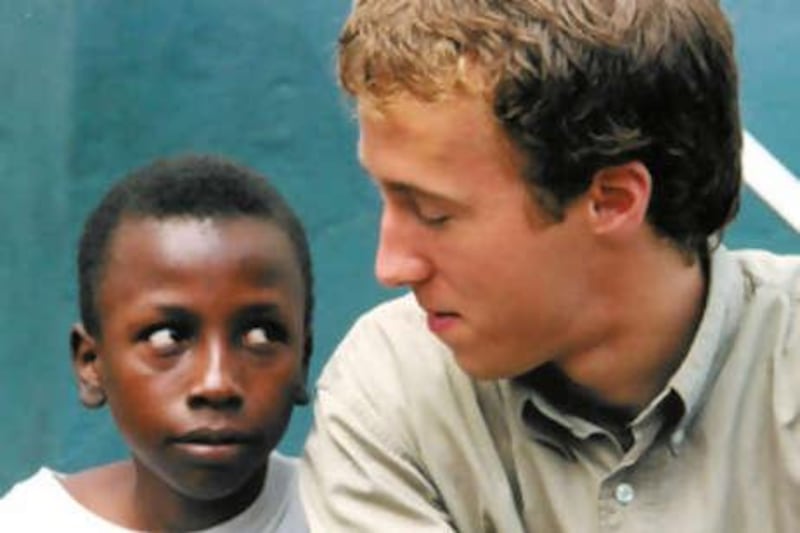 Craig Kielburger, pictured here with a child labourer, established Free the Children after reading a newspaper article about a Pakistani boy who was murdered for campaigning against child labour.