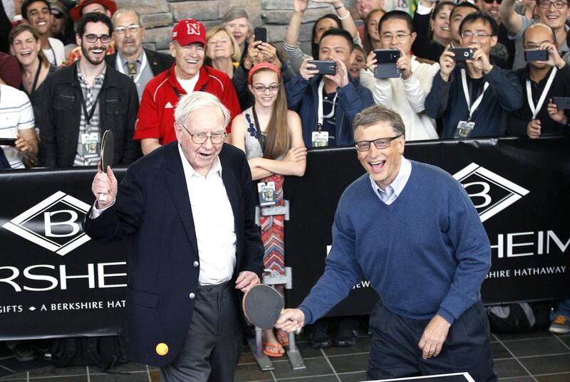 Berkshire Hathaway CEO Warren Buffett (left) and friend Bill Gates, founder of Microsoft. Rick Wilking / Reuters