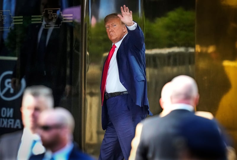Former President Donald Trump arrives at Trump Tower in New York on April 3. Trump is expected to be booked and arraigned on charges of hush money payments during his 2016 campaign. AP