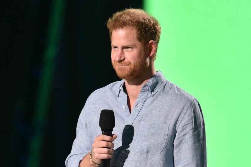 (FILES) In this file photo taken on May 02, 2021 Co-Chair Britain's Prince Harry, Duke of Sussex, speaks onstage during the taping of the "Vax Live" fundraising concert at SoFi Stadium in Inglewood, California. In a new documentary series set for release May 21, 2021 Prince Harry is once again emphasizing that his family turned a blind eye to the struggles of his wife Meghan Markle, saying he will "never be bullied into silence." / AFP / VALERIE MACON                       

