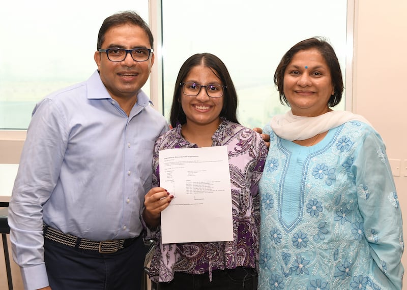 Riddhi Punamiya is all smiles as she poses with her grades.