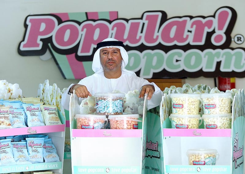 Khalid Al Shekaili built his business, Popular Popcorn, with a little help from the UAE's Khalifa Fund for young Emirati entrepreneurs. Satish Kumar / The National