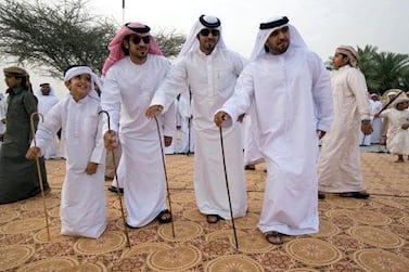 Men perform a traditional Arabic dance called the Razif at a wedding celebration of members of the Shehhi tribe in the village of Al Mahboobi in Al Rams near Ras Al Khaimah on April 17, 2009. Jeff Topping / The National