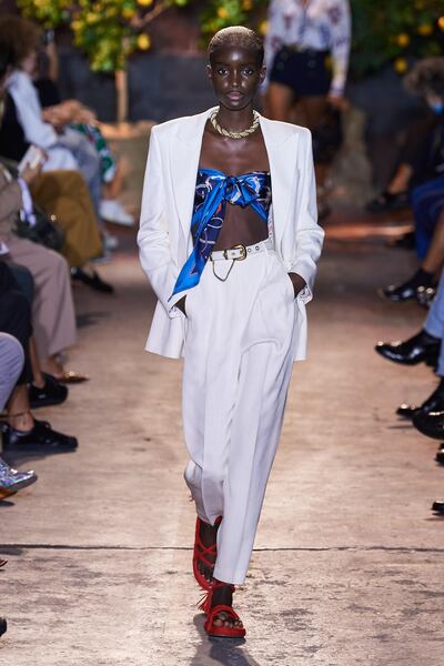 For spring/summer 2021, silk scarves were casually tied into bandeau tops over tailored trousers. Courtesy Etro