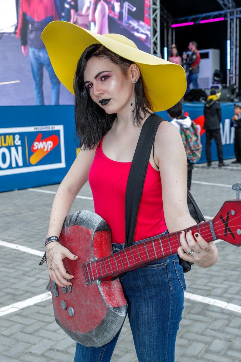 Dubai, April 12, 2019.  MEFCC day 2-
Comic Con goers at full swing on day 2.  Caoimhe Doherty as Marceline from Adventure Time.
Victor Besa/The National.
Section:  AC  
Reporter:  Chris Newbould