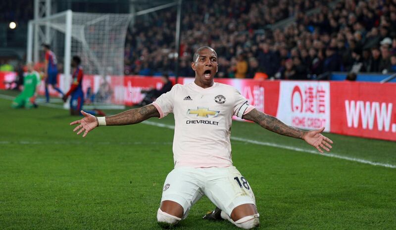 Ashley Young celebrates scoring United's third goal. Reuters