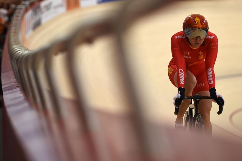 China's Zhong Tianshi competes against South Korea's Lee Hye-jin in the women's sprint semi-final track cycling event at the 2018 Asian Games in Jakarta.  AFP