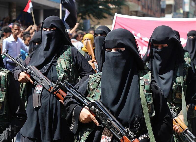 Women fighters in the pro-government resistance movement attend a rally marking the anniversary of south Yemen’s revolt against British colonial rule on October 14, 2015, in Taez city. Ahmad Al Basha / AFP