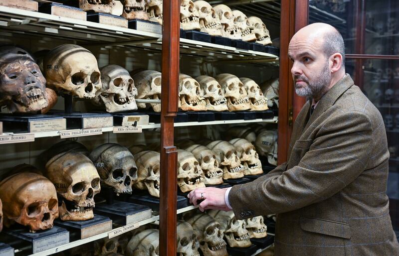 Tom Gillingwater of Edinburgh University in the room where the skulls of four Taiwanese tribal warriors had been kept. PA
