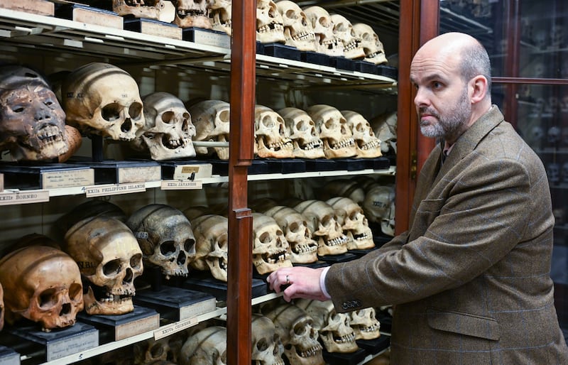 Tom Gillingwater of Edinburgh University in the room where the skulls of four Taiwanese tribal warriors had been kept. PA