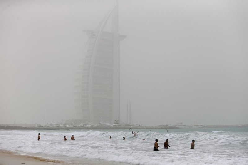 Dust obscures the Burj Al Arab. Sand and dust ‘should not be included as pollution’. Sarah Dea / The National