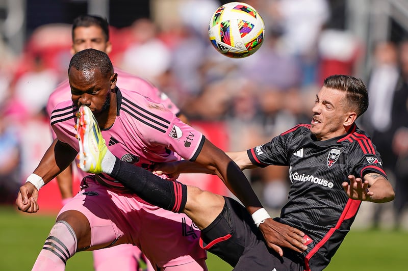 Inter Miami striker Shanyder Borgelin gets a boot to the face from DC United wing back Pedro Santos. AP