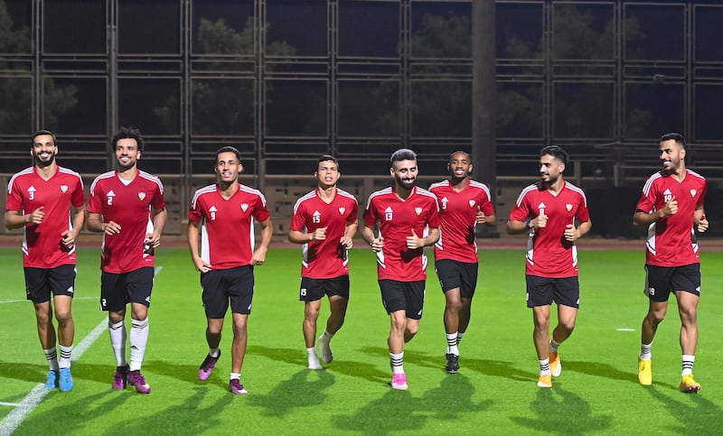 UAE players go through their warm-up.