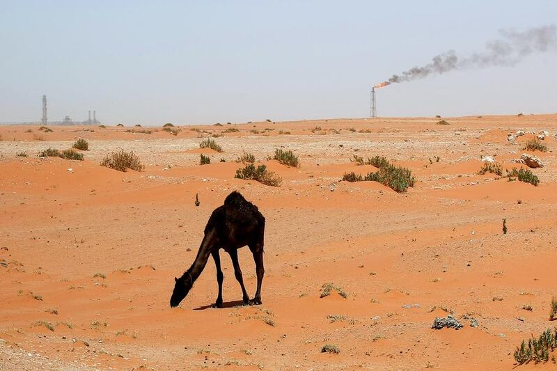 A flame from a Saudi Aramco oil installion known as Pump 3 is seen in the desert near the oil-rich area of Khouris, 160 kms east of the Saudi capital Riyadh. AFP
