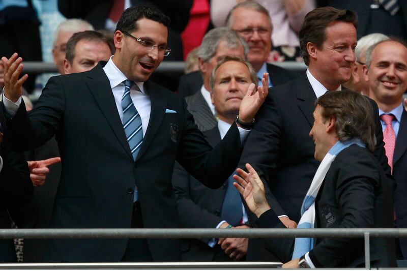 Khaldoon al Mubarak congratulates Roberto Mancini on winning the FA Cup.
