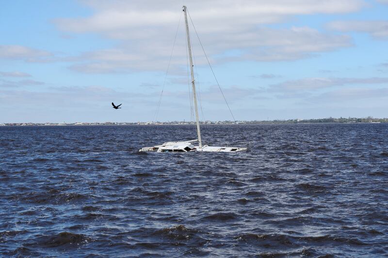 A submerged sailing boat off Punta Gorda, Florida, after Hurricane Ian passed through. Reuters