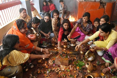 Devotees perform rituals on Bhai Dooj last year in Patna, Bihar. Getty Images
