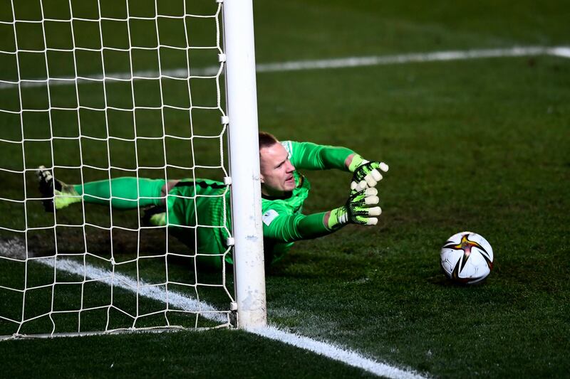 Barcelona's Marc-Andre ter Stegen saves a penalty during the shootout after the score finished 1-1 after extra-time. AP