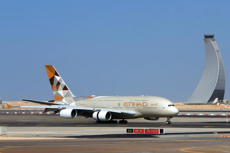 An Etihad Airbus A380 lands at Abu Dhabi International Airport. Ravindranath K / The National