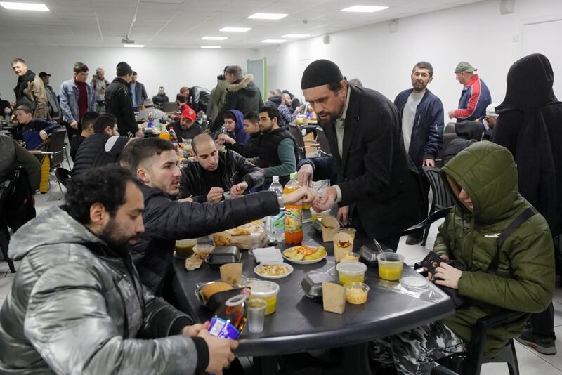 Ukrainian Muslims break their fast at the Ar-Rahma Mosque in Kyiv. EPA