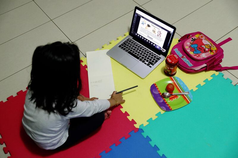 DUBAI, UNITED ARAB EMIRATES , April 9 – 2020 :- One of the student of FS 2 during the online class at her home in Masakin Al Furjan area in Dubai. All the schools are closed in the UAE as a preventive measure against coronavirus. (Pawan Singh / The National) For News/Online/Instagram.