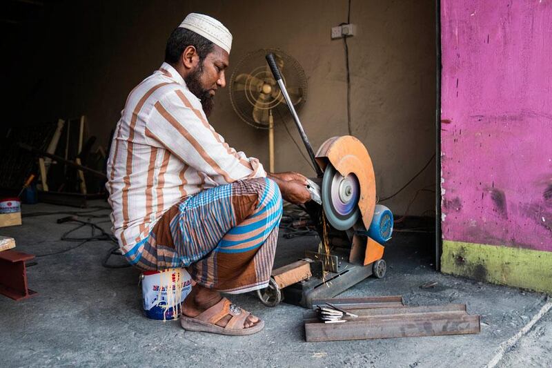 Muhammed Mufis, a Bangladeshi who has been in the UAE for two years,  
works in a small welding shop in the old quarter of Al Rams. Plans are  
under way to redevelop the neighbourhood in which his shop is located.
