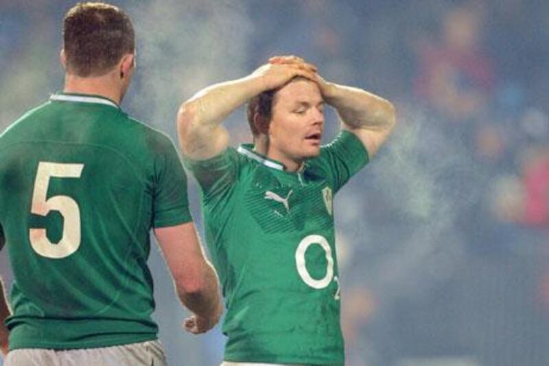 Donnacha Ryan, left, walks over to console Brian O'Driscoll, the Ireland captain, after their 22-19 loss to New Zealand on June 16 at Christchurch.