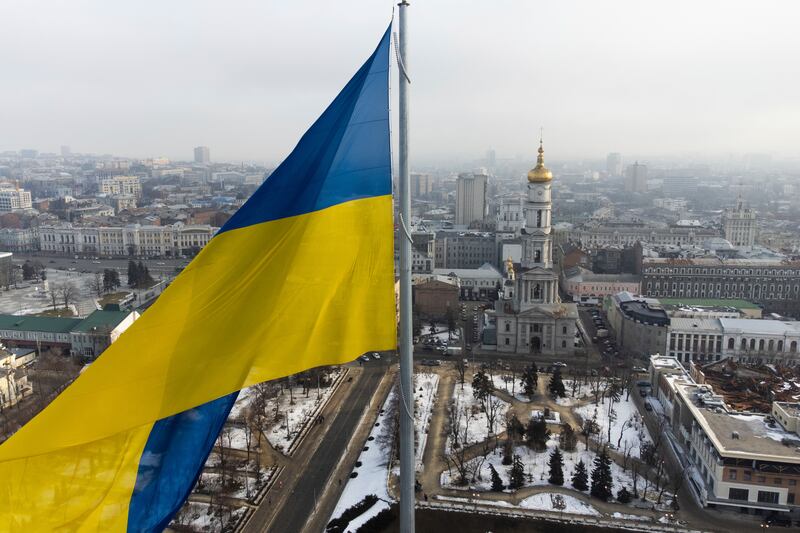 A flag waves over Kharkiv, Ukraine's second-largest city. The country's economy is projected to expand between 3 per cent and 4 per cent this year, according to the IMF. AP