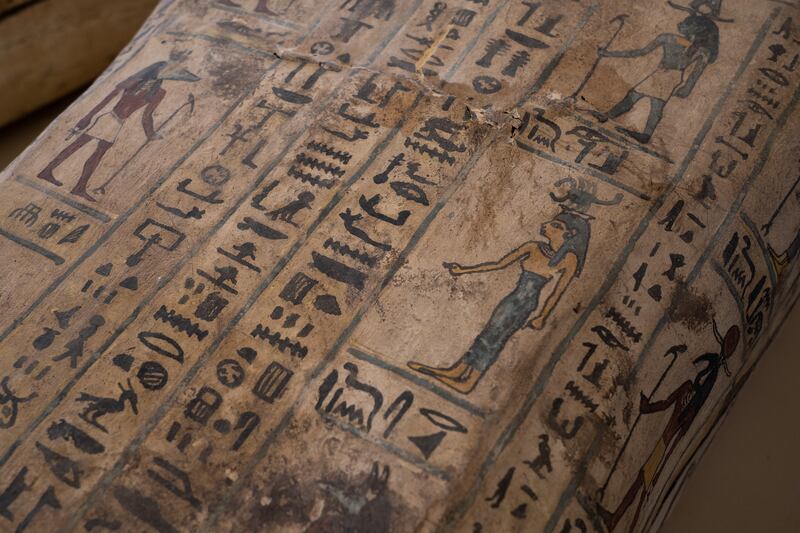 A "rare" papyrus scroll, expected to measure about 9 metres, was also found and could be part of the Book of the Dead. Mahmoud Nasr / The National