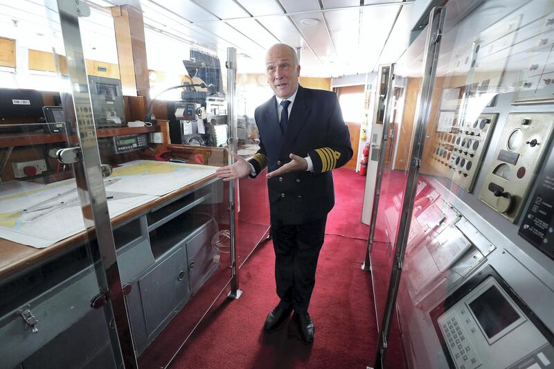 DUBAI, UNITED ARAB EMIRATES , Feb 20  – 2020 :- Peter Warwick , Head of Tour explaining about the Wheelhouse during the Bridge tour at the QE 2 in Dubai. (Pawan  Singh / The National) For Lifestyle. Story by Janice Rodrigues