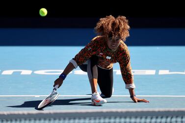 Japan's Naomi Osaka hits a return during a training session in Melbourne on January 31, 2021, ahead of the Australian Open tennis tournament starting on February 8. - -- IMAGE RESTRICTED TO EDITORIAL USE - STRICTLY NO COMMERCIAL USE -- / AFP / DAVID GRAY / -- IMAGE RESTRICTED TO EDITORIAL USE - STRICTLY NO COMMERCIAL USE --