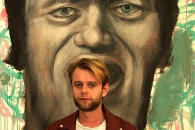 Philip Mueller in front of his work 'I Ate Myself Today'. Courtesy Carbon 12 Dubai