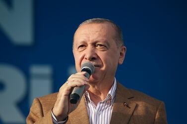 Turkey's President Recep Tayyip Erdogan addresses his ruling party members in eastern city of Malatya on October 25, 2020. Turkish Presidency via AP