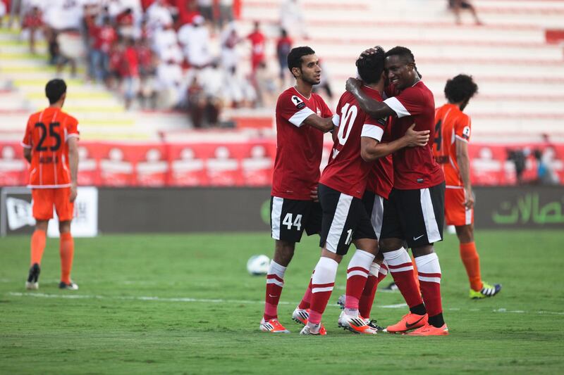 Dubai, UAE, October 14, 2012:

Dubai and Ajman faced off tonight in the Etisalat Cup. Ajaman , in the end, was victorious, 2-1, after a very sloppy first half. 

Al Ahli players surround Luis to congratulate him after he scored his team's only goal.

Lee Hoagland/The National