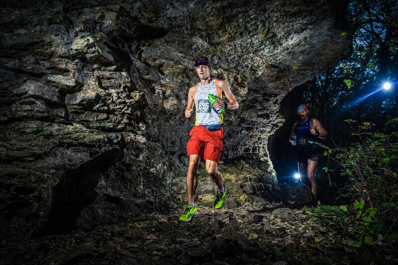 In this Sept. 28, 2019 photo provided by Mile 90 Photography shows runner Thomas Stanley, left, near the start of the FlatRock 50K on Saturday, Sept. 28, 2019 at the Elk City State Park, which is about 150 miles southwest of Kansas City, Missouri. Stanley was killed by lightning as he was about to finish the 50 kilometer (31.07 mile) race. Race organizers said in a Facebook post that Stanley was included as a finisher in the final results because, although he didn't cross the finish line, he completed the full distance. The results show he came in 11th out of 104 competitors. (Mile 90 Photography via AP)