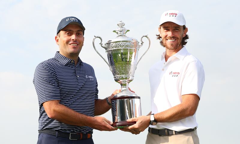 Francesco Molinari, captain of Continental Europe, and Tommy Fleetwood, captain of Great Britain and Ireland, pose with the trophy prior to the Hero Cup at Abu Dhabi Golf Club on January 11, 2023. Getty Images