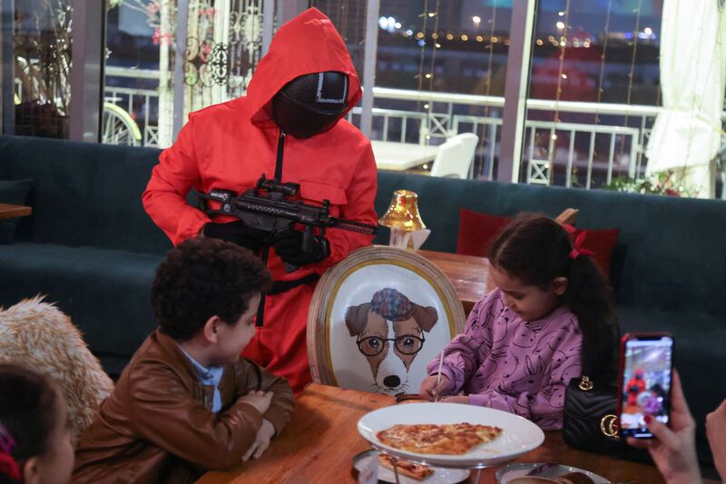 Children participate in the Honeycomb challenge in a restaurant in Riyadh.