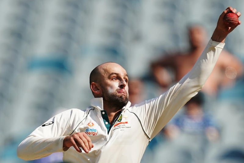 epa08093435 Nathan Lyon of Australia fields the ball on day 4 of the Boxing Day Test match between Australia and New Zealand at the Melbourne Cricket Ground (MCG) in Melbourne, Victoria, Australia, 29 December 2019.  EPA/MICHAEL DODGE -- EDITORIAL USE ONLY, IMAGES TO BE USED FOR NEWS REPORTING PURPOSES ONLY, NO COMMERCIAL USE WHATSOEVER, NO USE IN BOOKS WITHOUT PRIOR WRITTEN CONSENT FROM AAP -- AUSTRALIA AND NEW ZEALAND OUT