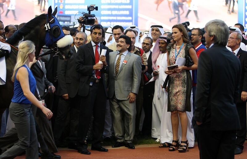 DUBAI , UNITED ARAB EMIRATES Ð Mar 31 : Diego Maradona ( center ) with other guests at the Meydan Racecourse in Dubai. ( Pawan Singh / The National ) For Sports. Story by Sarah
