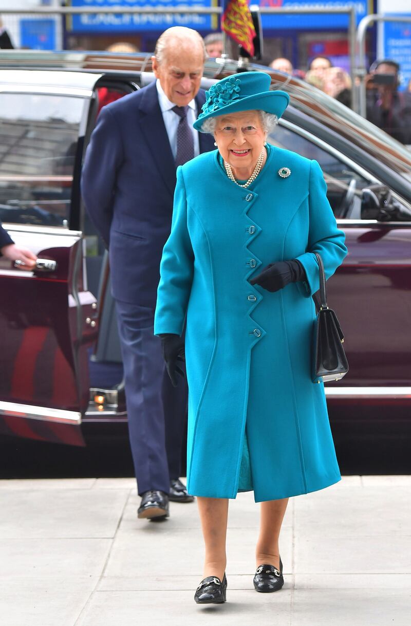 Queen Elizabeth II, wearing turquoise, and Prince Philip, Duke of Edinburgh, attend the official open the National Cyber Security Centre on February 14, 2017, in London. Getty Images