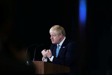 Britain's Prime Minister Boris Johnson gestures during a speech on domestic priorities at the Science and Industry Museum in Manchester, Britain July 27, 2019. Reuters