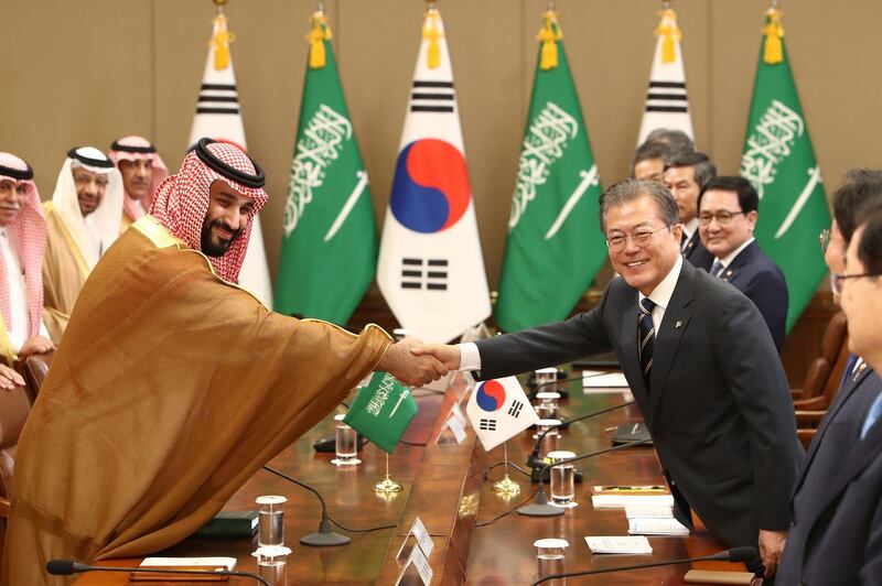 South Korean President Moon Jae-in  hakes hands with Saudi Crown Prince Mohammed bin Salman during a meeting at the Presidential Blue House in Seoul. Chung Sung-Jun / Getty Images