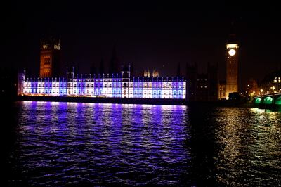 The Houses of Parliament are lit up blue and white in support of Israel on October 9 in London. Getty Images