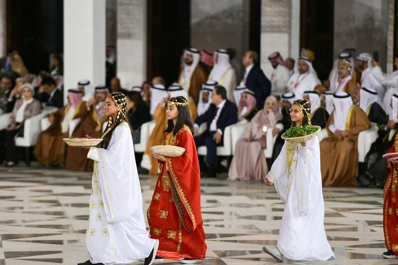 Children welcome Pope Francis at Sakhir Palace. Khushnum Bhandari / The National
