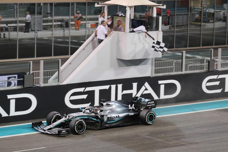 Mercedes driver Lewis Hamilton of Britain crosses the finish line during the Emirates Formula One Grand Prix, at the Yas Marina racetrack in Abu Dhabi, United Arab Emirates, Sunday, Dec.1, 2019. (AP Photo/Kamran Jebreili)